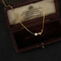 pearl fish necklace