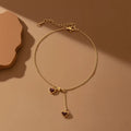 gold heart bracelet
